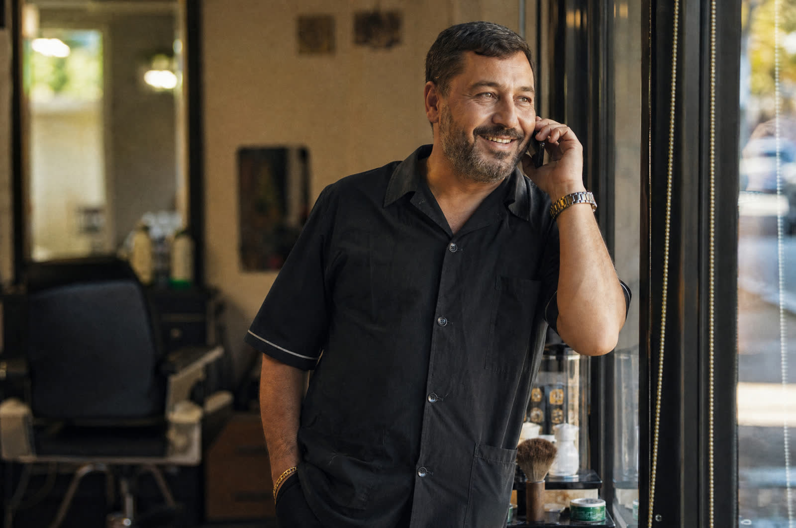 Auto repair shop owner in his bay